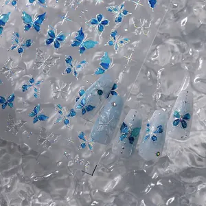 5D reliëf blauwe vlinder nagelstickers met zilveren randen en sterretjes motieven