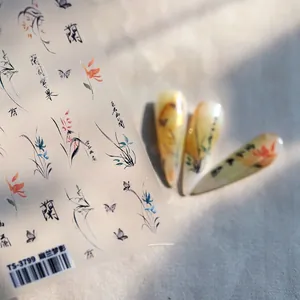 Detail view of ink painting orchid nail art stickers with butterfly patterns and calligraphy