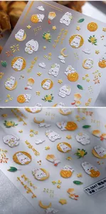 Detailed view of 5D embossed nail stickers featuring Mid-Autumn rabbits and gold lanterns
