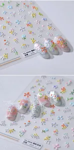 Macro detail of 3D embossed floral nail stickers TS-3808 with colorful flower patterns