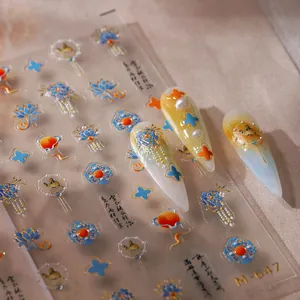 Chinese style nail art stickers with lotus and fan designs in gold foil relief finish