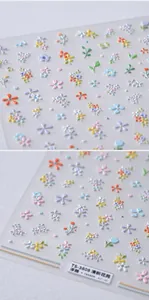 Close-up of TS-3808 self-adhesive 3D embossed nail art stickers with floral daisy patterns