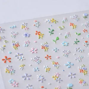 3D floral embossed nail stickers with colorful macaron flower patterns on matte background