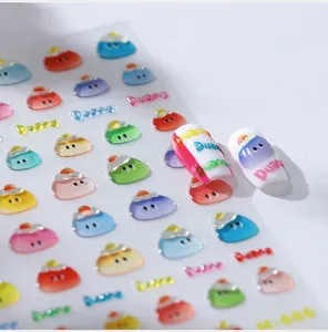 3D embossed cute jelly person nail art stickers featuring colorful faces and Duang text
