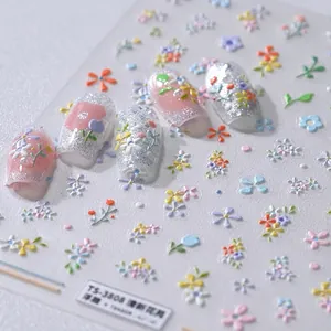 3D embossed floral nail art stickers TS-3808 with pastel flower designs on model nails