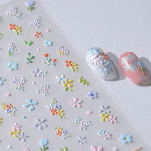 3D embossed floral nail stickers with matte finish and pastel flower designs for manicure
