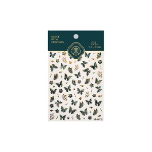 Deep green and gold butterfly embossed nail stickers with star accents in M-670 packaging