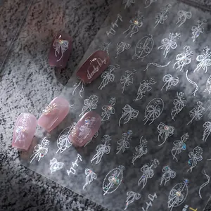 3D embossed heart bow nail stickers with Lucky Day text on neutral stone background