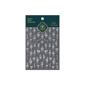 3D embossed heart and bow nail stickers with silver floral patterns and rhinestones