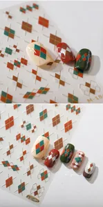 Detail of M-184 argyle pattern nail stickers in forest green and terracotta with gold lines