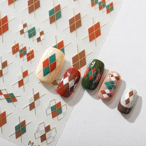 British style argyle pattern nail stickers with metallic gold lines in Maillard colors