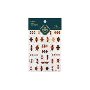 British style geometric plaid nail stickers in brown and orange with gold accents