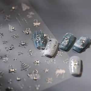 Silver 3D embossed Christmas nail stickers with snowflakes and reindeer patterns