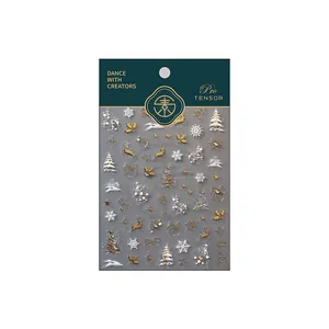 Christmas nail art stickers with 3D gold and white deer and snowflake designs