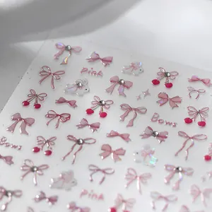 3D embossed nail stickers featuring pink bows, cherries, and rabbit designs for cute nail art