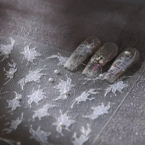 Elegant 3D white flower nail art stickers with pearl accents for manicure decoration