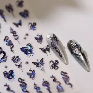 Holographic nail stickers featuring dark butterfly and snake patterns with a 3D relief effect
