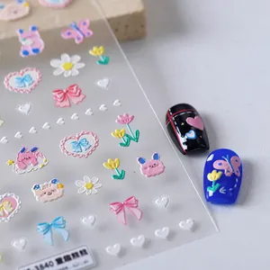 3D embossed cartoon nail stickers with pink rabbits and colorful floral patterns