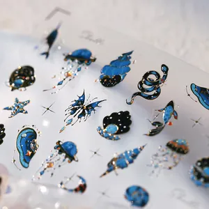 Luxe gold-foiled deep sea and starry sky themed adhesive nail art stickers