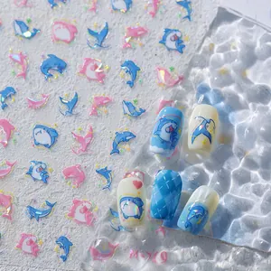 Laser ocean stickers featuring blue dolphins and pink sharks for nail art decoration