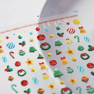 3D embossed Christmas nail art stickers with glitter Xmas tree and bell patterns