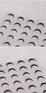 Macro detail of French gradient nail stickers with 3D embossed crescent textures