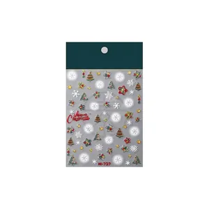 Stickers à ongles de Noël avec gaufrage 3D sapins et flocons sur fond blanc pur