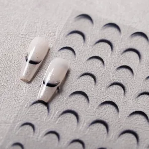 French gradient nail stickers with black crescent patterns and silver glitter detail