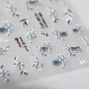 Elegant bronzing nail stickers with white flowers and Chinese calligraphy motifs