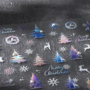 Christmas laser nail stickers with reindeer, snowflake patterns and pearl accents