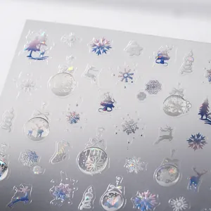 Adesivi per unghie olografici natalizi con fiocchi di neve laser, alce e motivi invernali