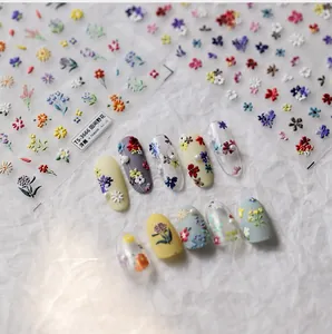 Detailed view of 3D embossed wild flower nail art stickers and finished petal effect