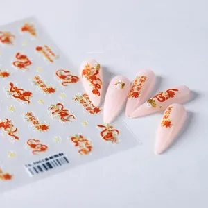 Detailed view of TS-2201 Year of the Snake nail stickers with gold and red floral motifs