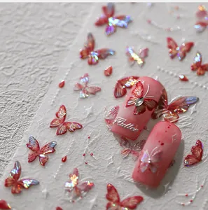 Macro shot of 5D embossed butterfly nail art stickers with aurora iridescent texture