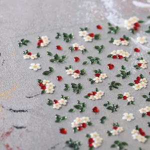 3D relief nail stickers featuring white flowers and strawberries on marble background
