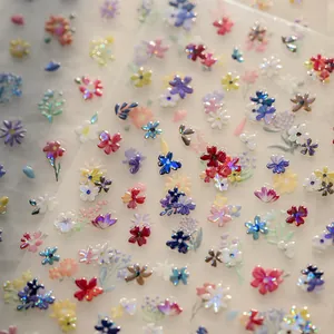 3D embossed floral nail art stickers with iridescent finish and colorful shell gloss effects