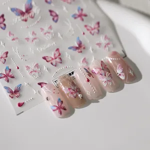 Self-adhesive 5D butterfly nail stickers with 3D embossed pink and blue gradient designs