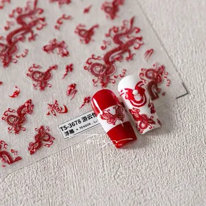 Macro detail of Chinese dragon and butterfly embossed nail stickers with 3D texture