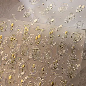 3D embossed gold tulip nail art stickers with metallic texture and floral patterns