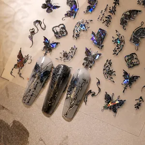 Holographic butterfly and floral nail art stickers with metallic embossed 3D texture