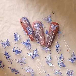 5D embossed nail art stickers with iridescent blue butterflies and Chinese motifs
