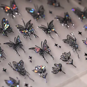 Holographic butterfly nail stickers with floral patterns and laser gold finishes