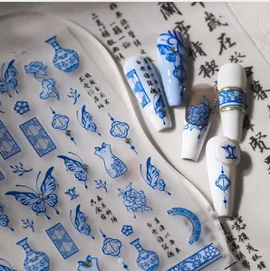Blue and white porcelain style nail stickers with lotus and butterfly designs