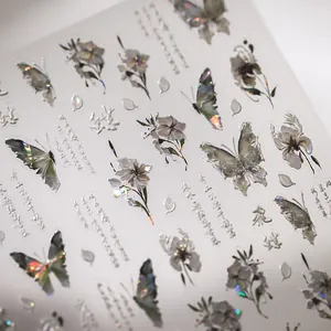 Laser holographic butterfly and floral nail stickers with Chinese calligraphy art