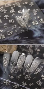 Detailed 3D embossed silver rose nail stickers with metallic texture for DIY manicure