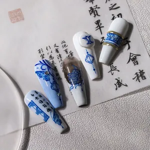 Blue and white porcelain style 3D press on nails with lotus patterns and scroll art