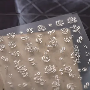 5D Embossed silver rose nail art stickers with elegant floral patterns on matte film