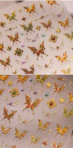 Détail d'autocollant nail art papillon 3D avec finition métallique laser dorée
