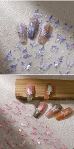 Detailed laser butterfly nail art stickers with glitter and Chinese calligraphy accents
