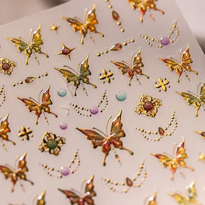 Autocollants 3D dorés en relief pour ongles avec papillons et motifs de lune métallisés